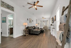 Front entry looks towards living room, dining area and kitchen.