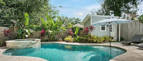 Enjoy this gorgeous private oasis! Lounge chairs and umbrella NOT provided. Non-heated pool. Jacuzzi IS heated!