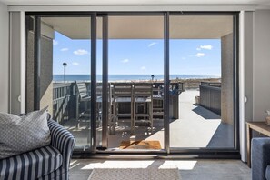 Stunning panoramic oceanfront views from outdoor dining space on patio
