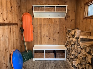 Mudroom and equipment storage. Firewood provided.