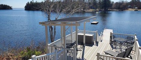 The newly renovated lakeside deck is the hub of activity Spring, Summer & Fall.