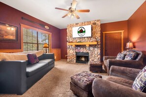 The Living Room includes a Sofa Bed, Cable TV/DVD, and a Seasonal  Fireplace