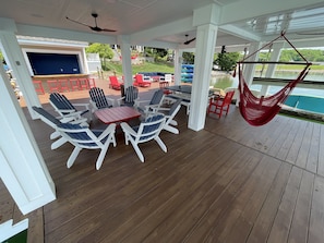 Multiple areas to enjoy family and friends on the dock with wide water views