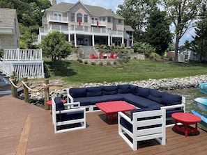 Multiple areas to enjoy family and friends on the dock with wide water views