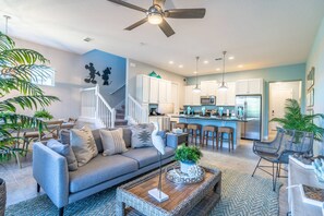 Open floor plan on the ground floor with access to the pool