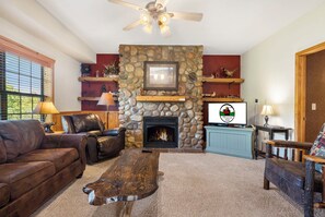 Living Room includes Sofa Bed, Fireplace, and Cable TV