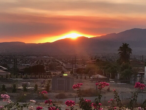 GET YOUR FAVORITE WINE READY FOR THE BEAUTIFUL SUNSET.