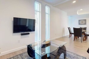 Sit back and relax while watching your favorite Netflix shows on this smart TV.