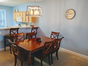 Dining room table seats 6 plus 2 at the Breakfast Bar