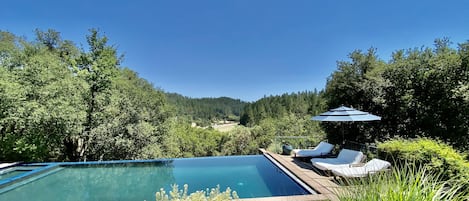 Villa Luba Helena's large heated infinity edge pool overlooking Napa Valley