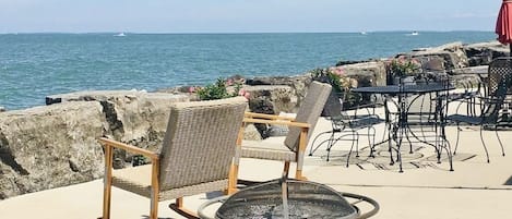 Enjoy the lake front patio with lots of seating for your group.