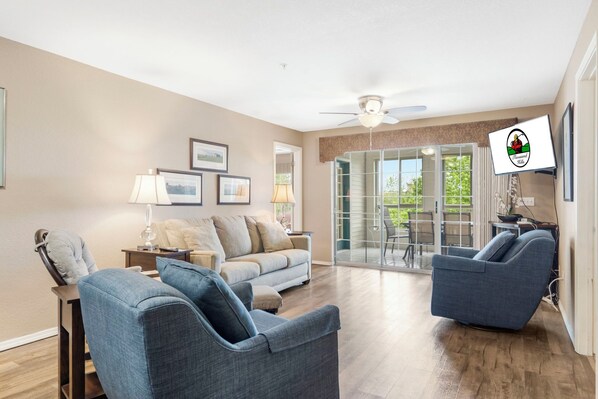 Living area with Sunroom Access, Sofa Slwwper, and Cable TV