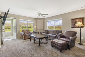Living Area with Sunroom Access, Cable, Flatscreen TV and Sofa Bed