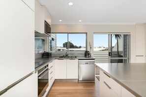 Kitchen opening to deck 