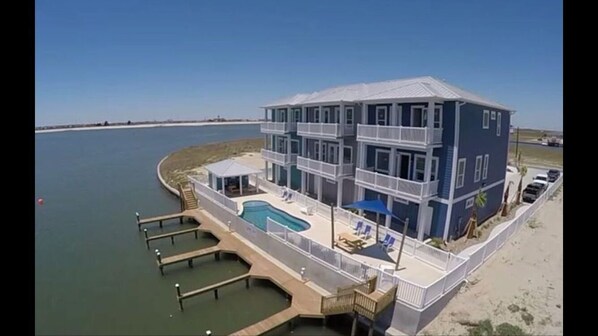 The common areas share a heated pool, picnic tables, outside shower and  bathroo