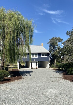 The driveway has ample parking for four vehicles and/or a boat trailer.