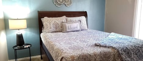 Queen bed featured in our private bedroom