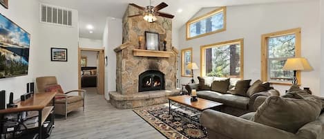 Welcoming & HUGE Great room with 65" HDTV, wood-burning fireplace, comfy couches