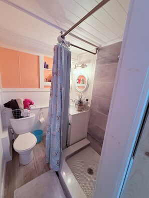 Shower stall in bathroom
