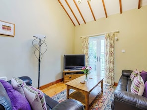 Living area | Ysgubor - Rhyddallt Ganol Cottages, Caethro, near Caernarfon