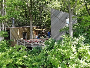 The house sits on a bluff overlooking the lake.