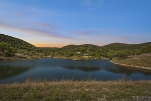 Tranquil lakeside views with stunning sunsets nestled in Texas Hill Country.