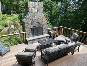 New deck and outdoor fireplace offers privacy, views and a great place to relax
