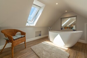 Tudor Rose, Aylsham: Slipper bath in the bedroom