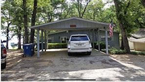 Carport—Allows two vehicles- also parking for 2 vehicles to the right. 