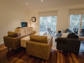 Sun drenched living areas with views of the bush