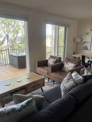 Living room with floor to ceiling window with fantastic view.  fold out sofa 