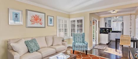 The living room with lots of light and casual coastal decor