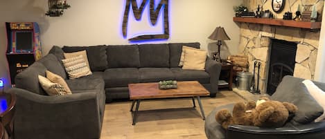 Living Room w/Large comfortable sectional and large barrel chair 