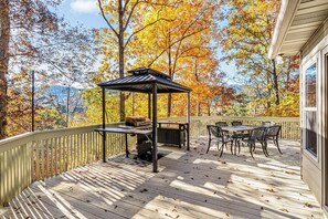 Propane grill with gazebo on wrap around deck with outdoor seating and gorgeous views!