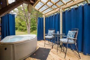 Private hot tub relaxation on a chilly night