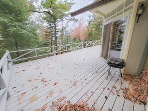 Giant outdoor deck with a view of the lake and the sunset