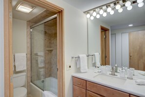 Master Bathroom features Shower and Bathtub