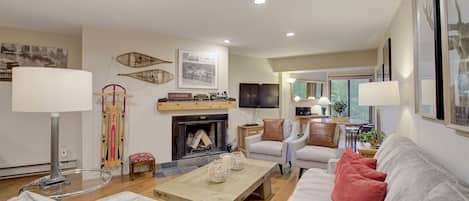 Comfortable Living Room with Fire Place and TV