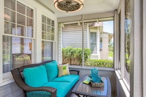 Relax on this private screened in front porch.