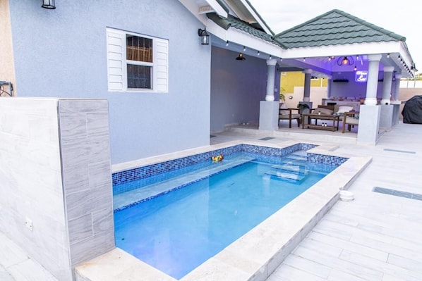 Private pool in backyard 