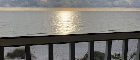 Beautiful sunset view from the huge (+/- 150 sq ft) screened Lanai.