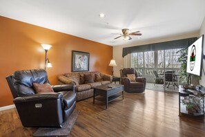 Living Room features Cable TV/DVD, Sofa Bed, and Sunroom Access