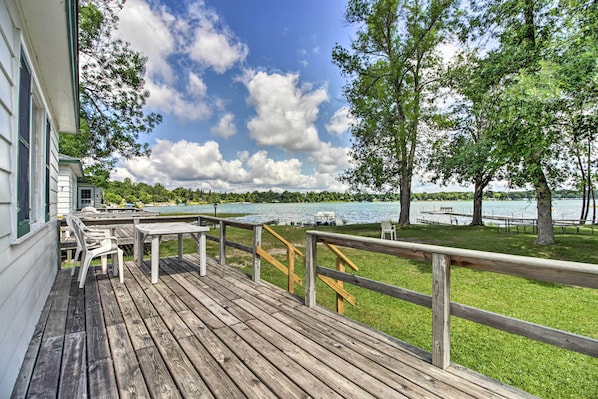 Soak up the sun from the deck of this 2-bed, 1-bath Dent vacation rental cabin.