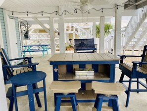 Extra bar seating under the house 