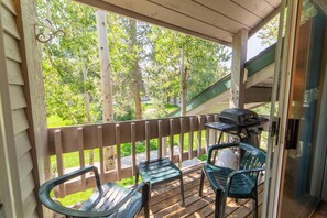 Peaceful Covered Balcony with BBQ Grill