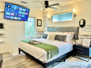 Super comfortable king size platform bed with wall-mounted headboard