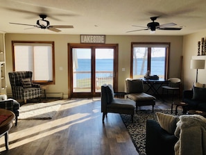 Lakeside family room with gas fireplace.