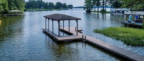 Very close to main lake and Washburns Marina!  Private dock for your boat.