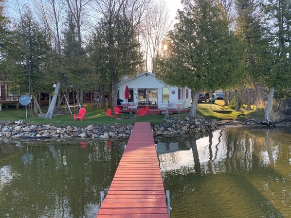 Waterfront with dock.  Sandy bottom