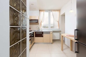 The kitchen's modern appliances make meal preparation easy.